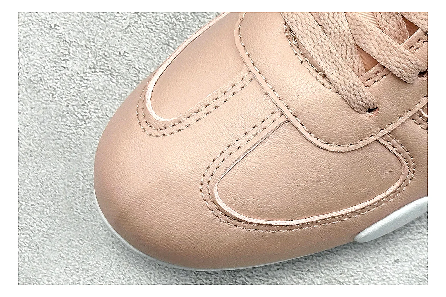 Nike Sprint Sister Pink comparison photo showing soft pink retro-runner upper, slim side profile, low collar, and light casual sole thumbnail 5