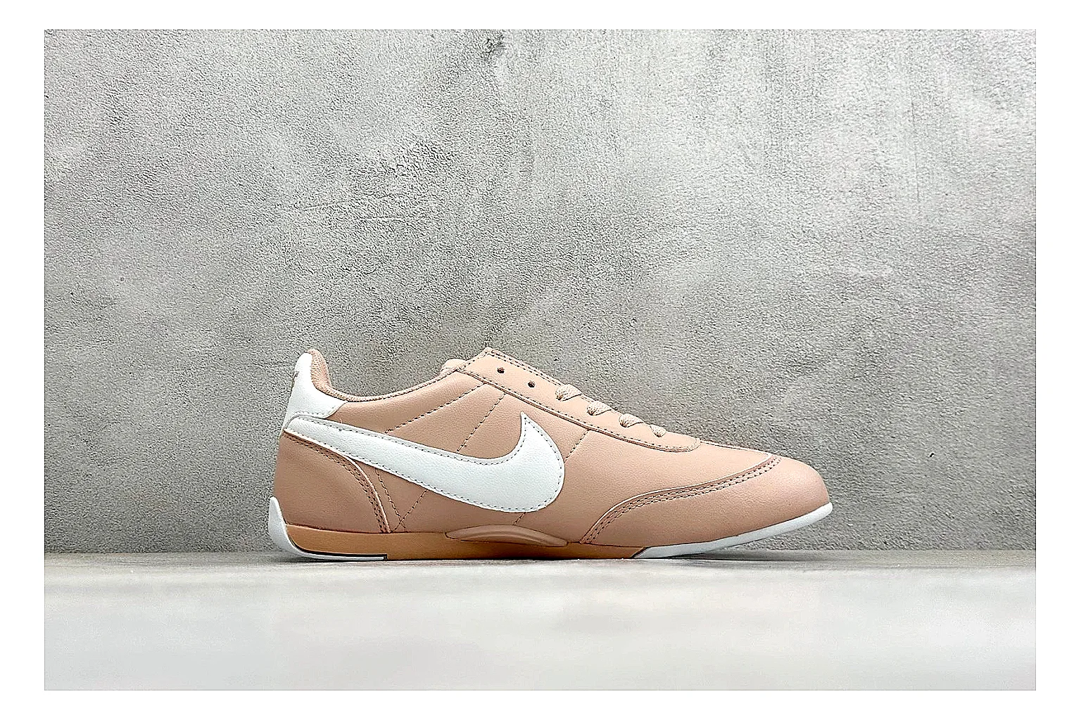 Nike Sprint Sister Pink comparison photo showing soft pink retro-runner upper, slim side profile, low collar, and light casual sole thumbnail 6