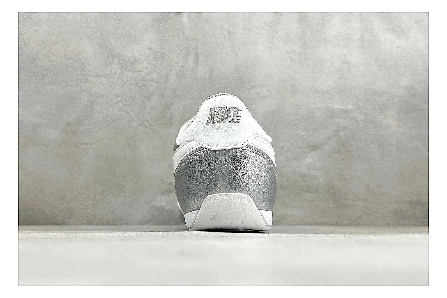 Nike Sprint Sister Silver comparison photo showing silver retro-runner upper, slim low-top shape, layered side panels, and a light everyday sole thumbnail 3