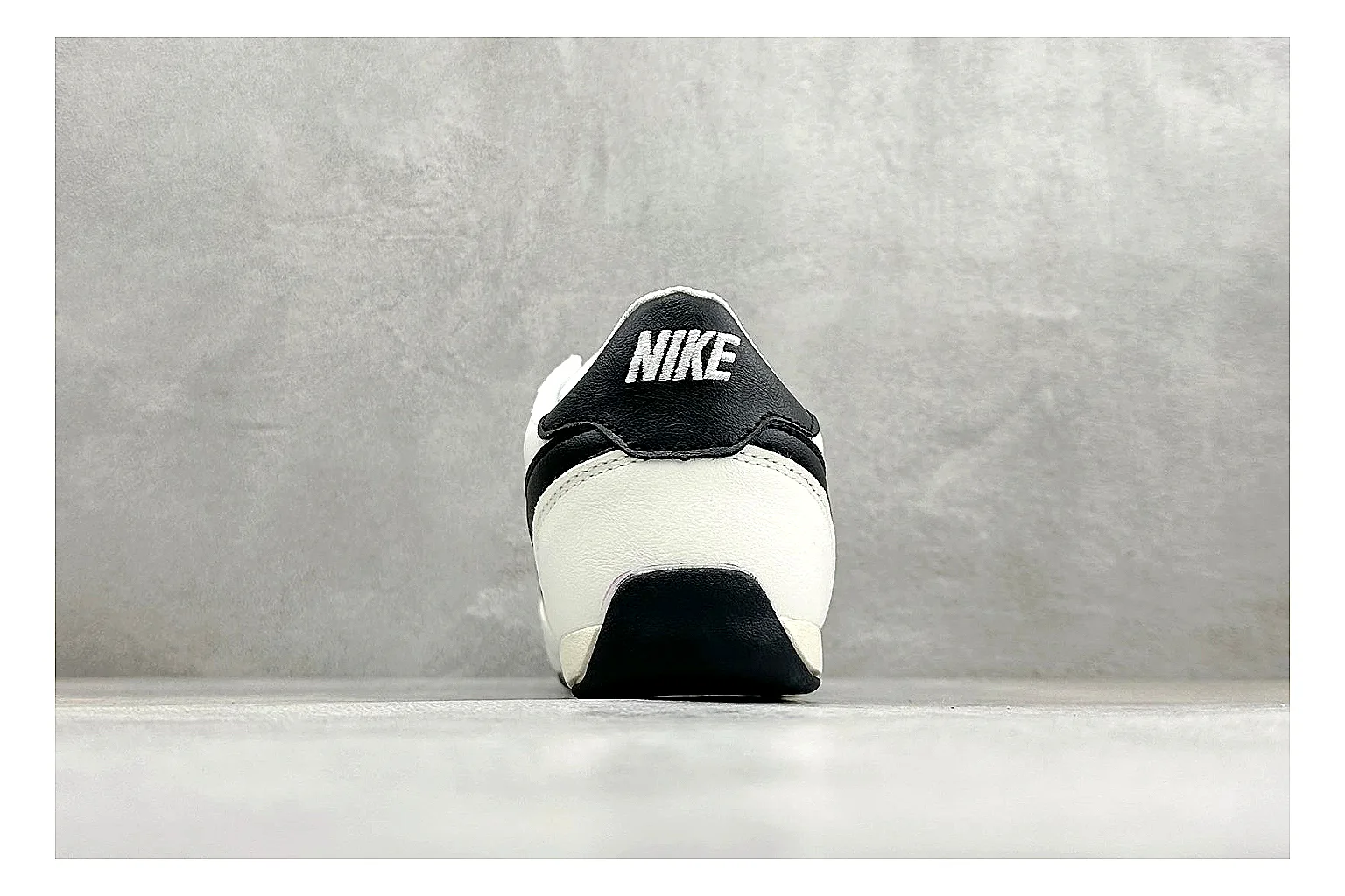Nike Sprint Sister White Black comparison photo showing white retro-runner upper, black Swoosh contrast, slim low-top profile, and light casual sole thumbnail 3