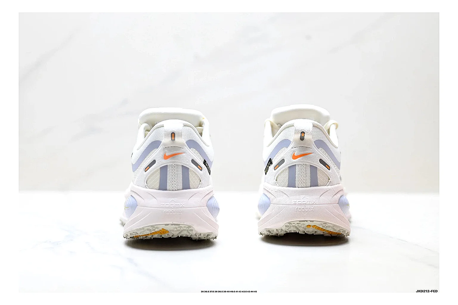 Nike Vomero White Orange comparison photo showing white mesh runner upper, orange accents, layered Vomero-style panels, and cushioned modern sole thumbnail 3