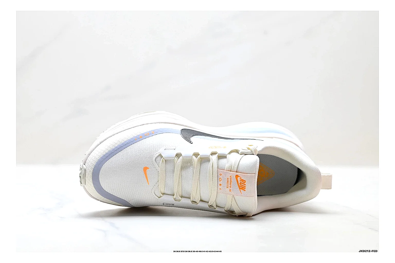Nike Vomero White Orange comparison photo showing white mesh runner upper, orange accents, layered Vomero-style panels, and cushioned modern sole thumbnail 6