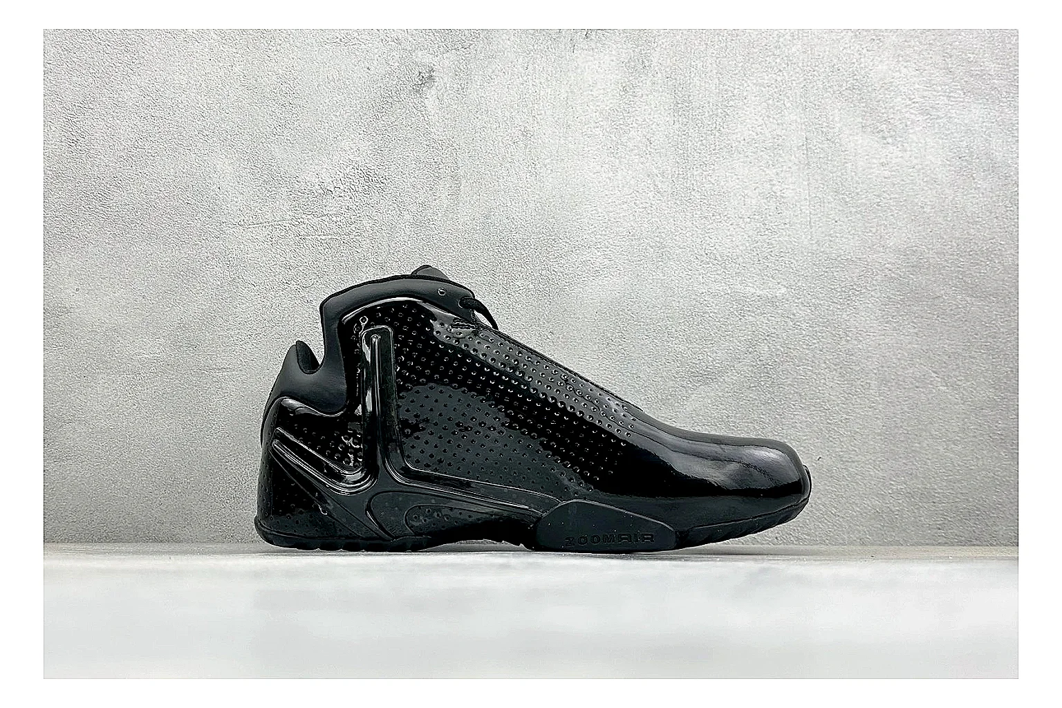 Nike Zoom Hyperflight Black comparison photo showing glossy black basketball upper, sleek shell shape, subtle Swoosh detail, and sculpted court sole thumbnail 6