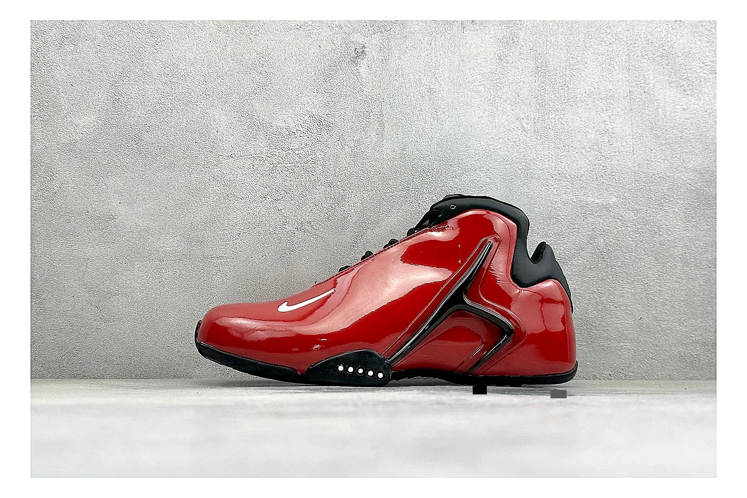 Nike Zoom Hyperflight Red comparison photo showing red glossy basketball upper, streamlined shell, black detail lines, and sculpted court sole