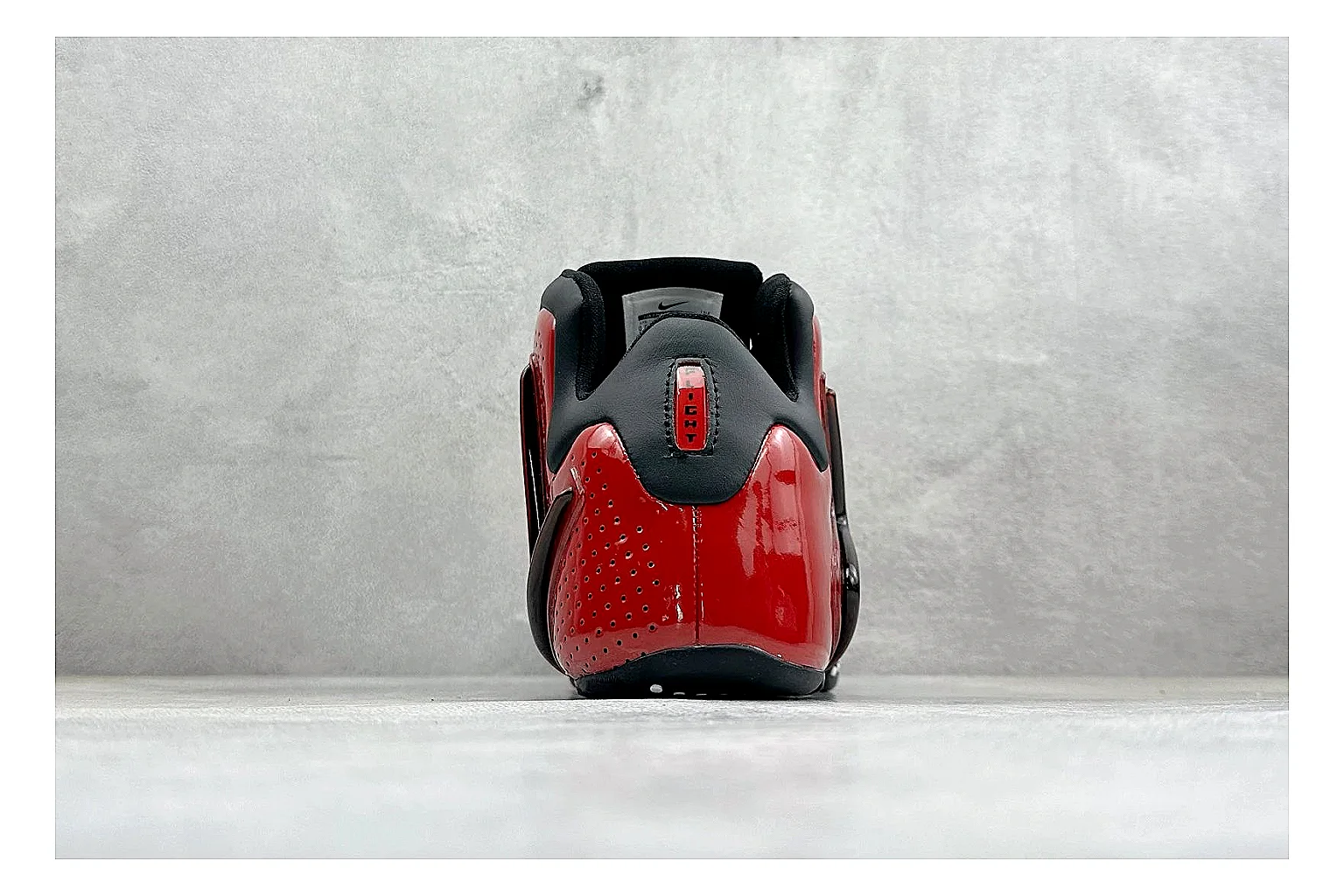 Nike Zoom Hyperflight Red comparison photo showing red glossy basketball upper, streamlined shell, black detail lines, and sculpted court sole thumbnail 3