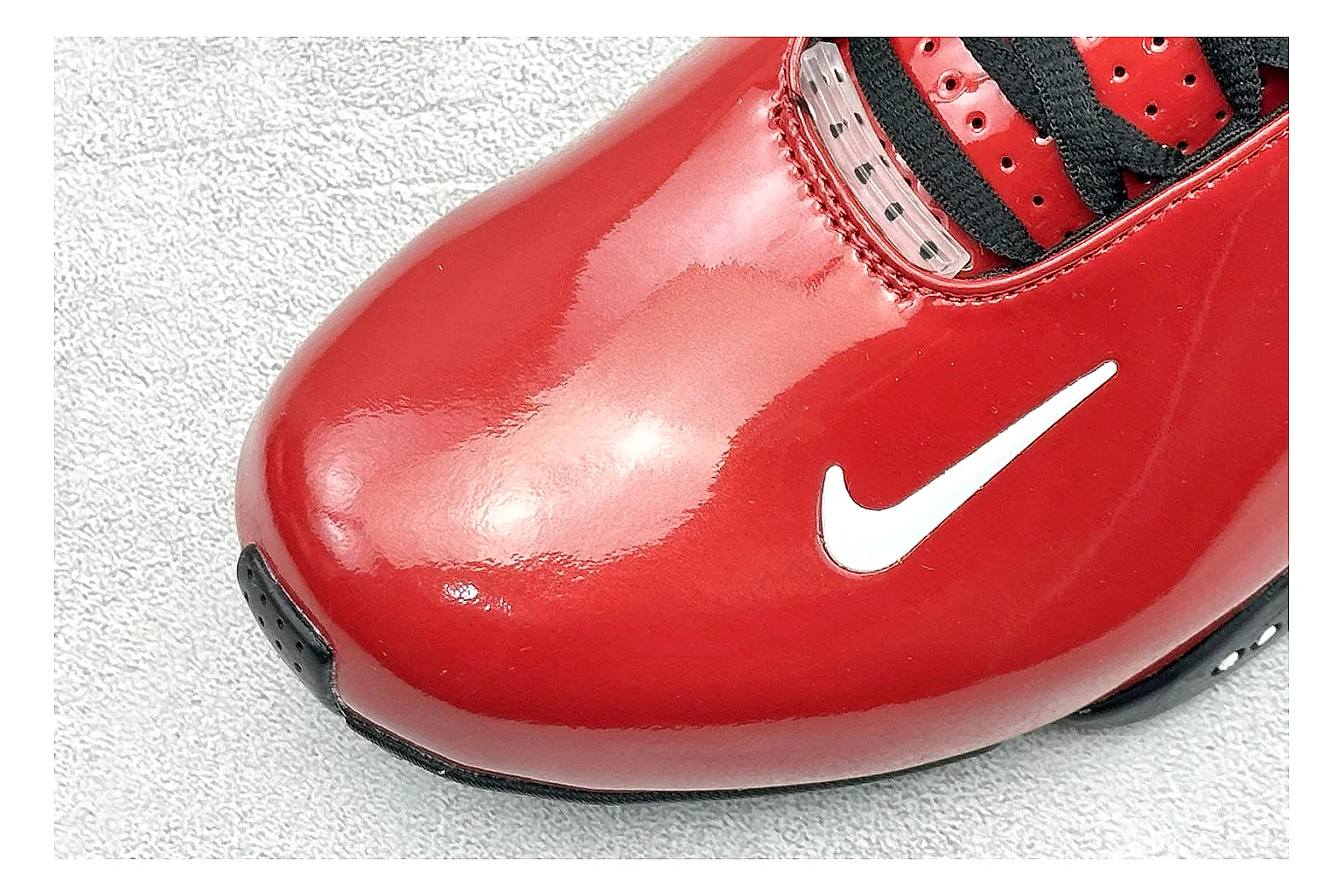 Nike Zoom Hyperflight Red comparison photo showing red glossy basketball upper, streamlined shell, black detail lines, and sculpted court sole thumbnail 5