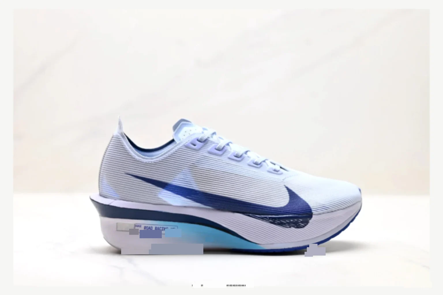 Nike ZoomX Vapor White Blue Runner comparison proof image SKU 1182167428