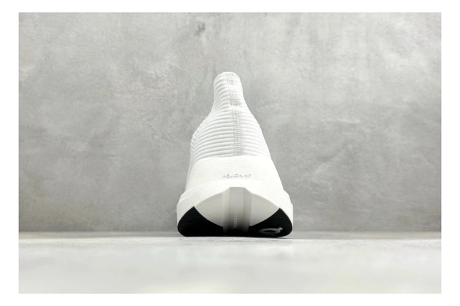 On Cloudboom White Black comparison photo showing white performance mesh, black contrast details, slim racing profile, and segmented CloudTec sole thumbnail 3