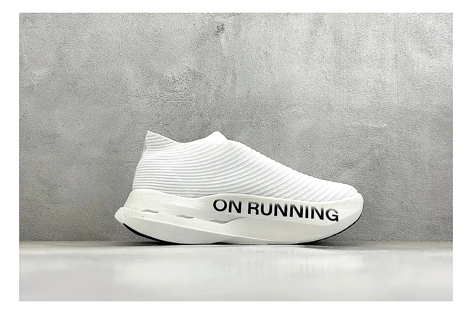 On Cloudboom White Black comparison photo showing white performance mesh, black contrast details, slim racing profile, and segmented CloudTec sole thumbnail 6