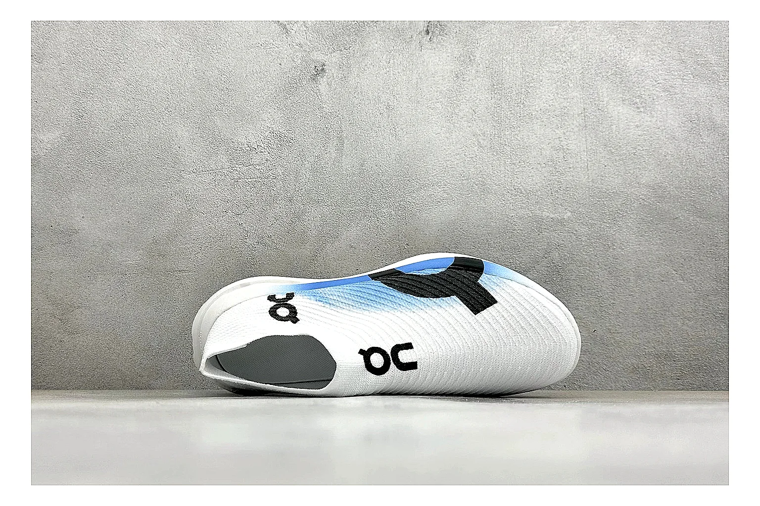 On Cloudboom White Blue comparison photo showing white performance mesh, blue gradient accents, slim racing profile, and segmented CloudTec sole thumbnail 2