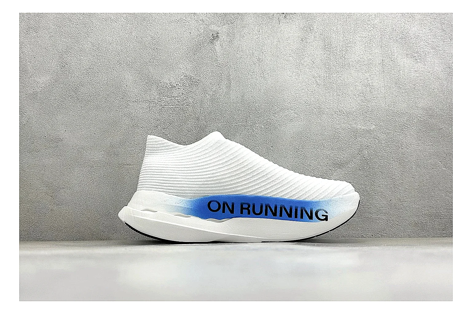On Cloudboom White Blue comparison photo showing white performance mesh, blue gradient accents, slim racing profile, and segmented CloudTec sole thumbnail 6