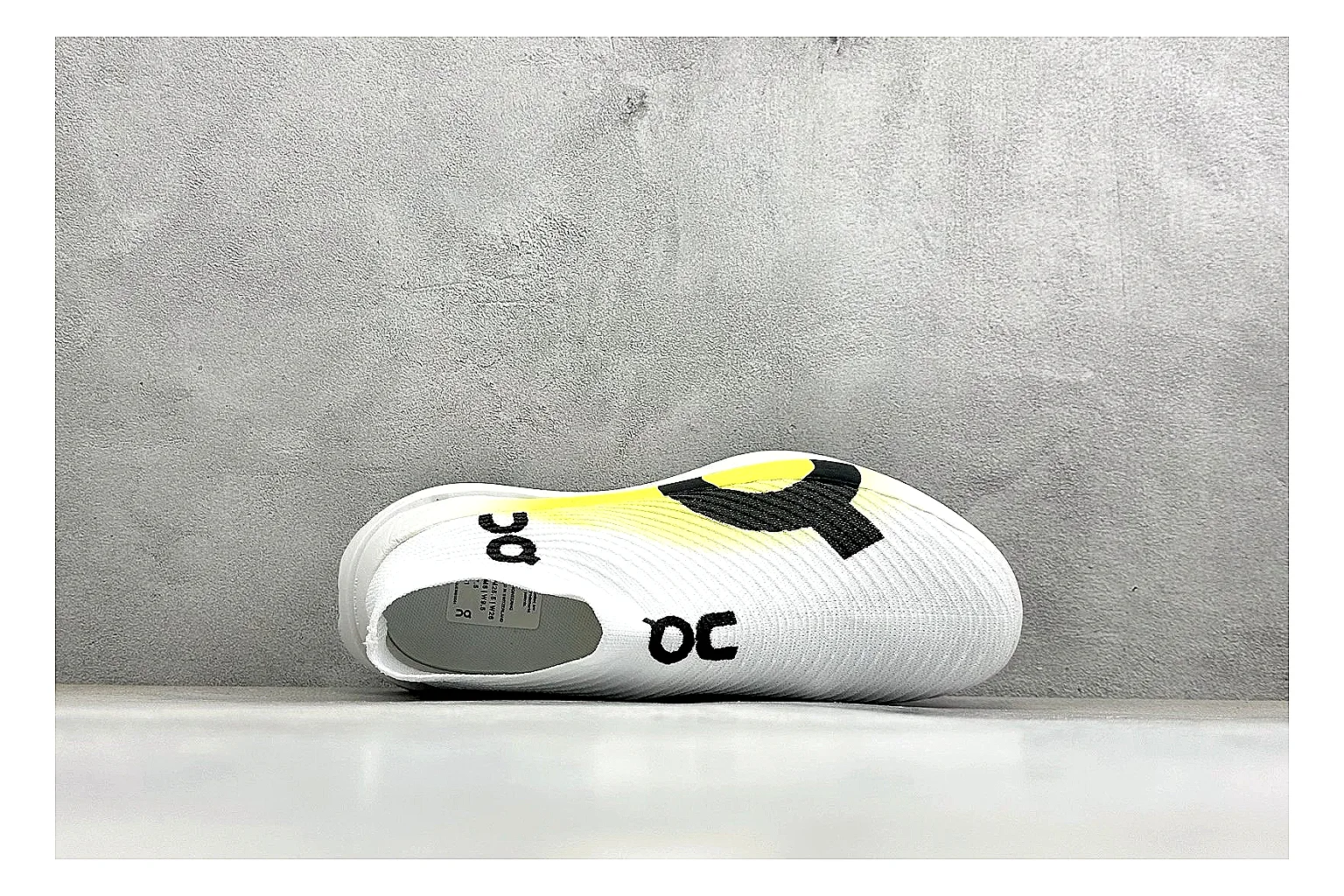 On Cloudboom White Lime comparison photo showing white performance mesh, lime gradient accents, slim racing profile, and segmented CloudTec sole thumbnail 2