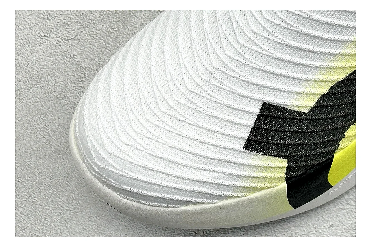 On Cloudboom White Lime comparison photo showing white performance mesh, lime gradient accents, slim racing profile, and segmented CloudTec sole thumbnail 5