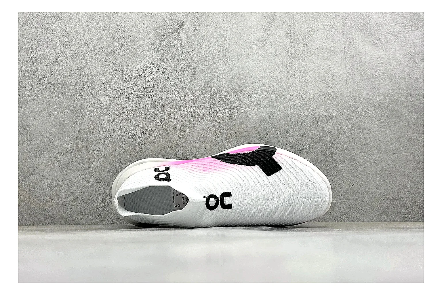 On Cloudboom White Pink comparison photo showing white running mesh, pink gradient accents, low racing shape, and segmented CloudTec sole thumbnail 2