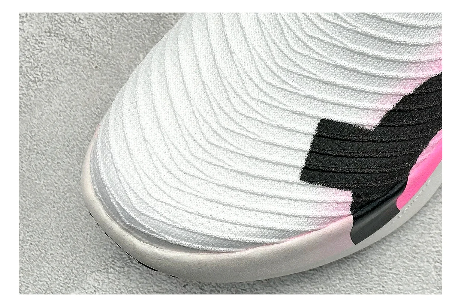 On Cloudboom White Pink comparison photo showing white running mesh, pink gradient accents, low racing shape, and segmented CloudTec sole thumbnail 5