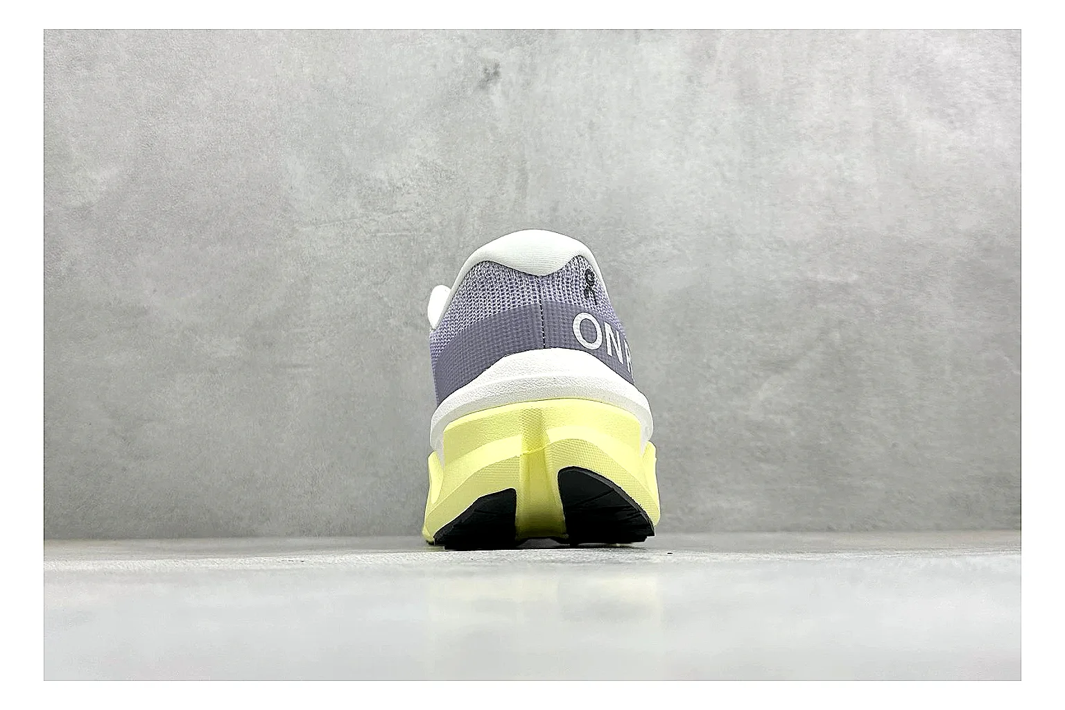 On Cloudmonster Lavender Lime comparison photo showing lavender runner upper, lime accent hits, oversized CloudTec pod sole, and soft technical color mix thumbnail 3