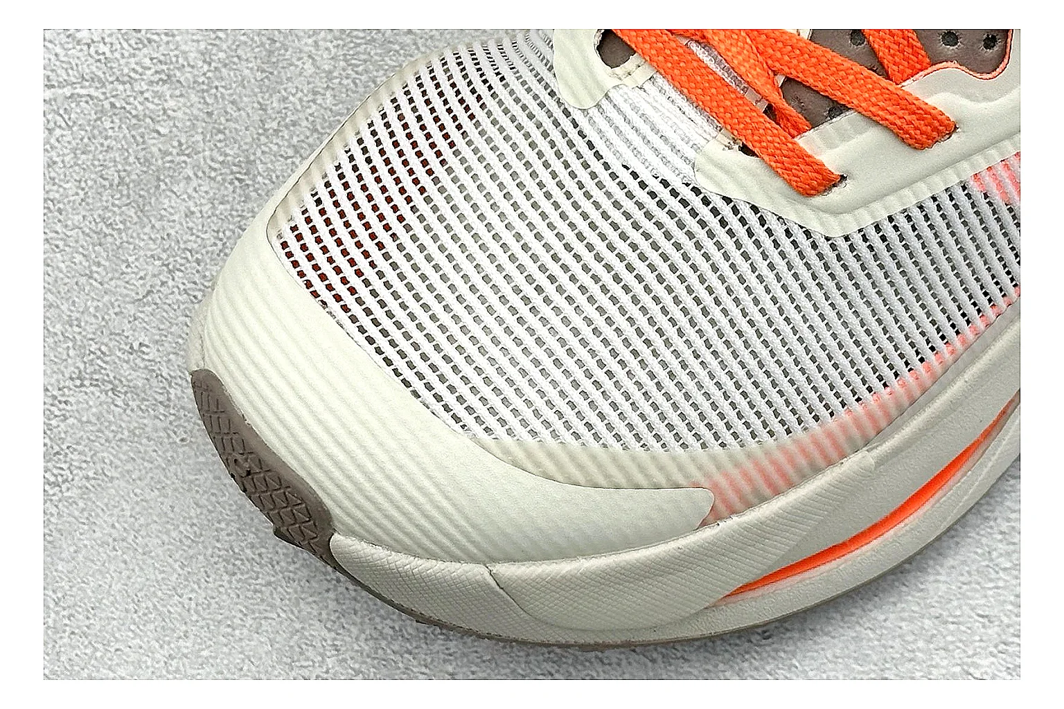 On Cloudmonster White Orange comparison photo showing white running mesh, orange accent hits, oversized CloudTec sole pods, and a rounded runner silhouette thumbnail 5