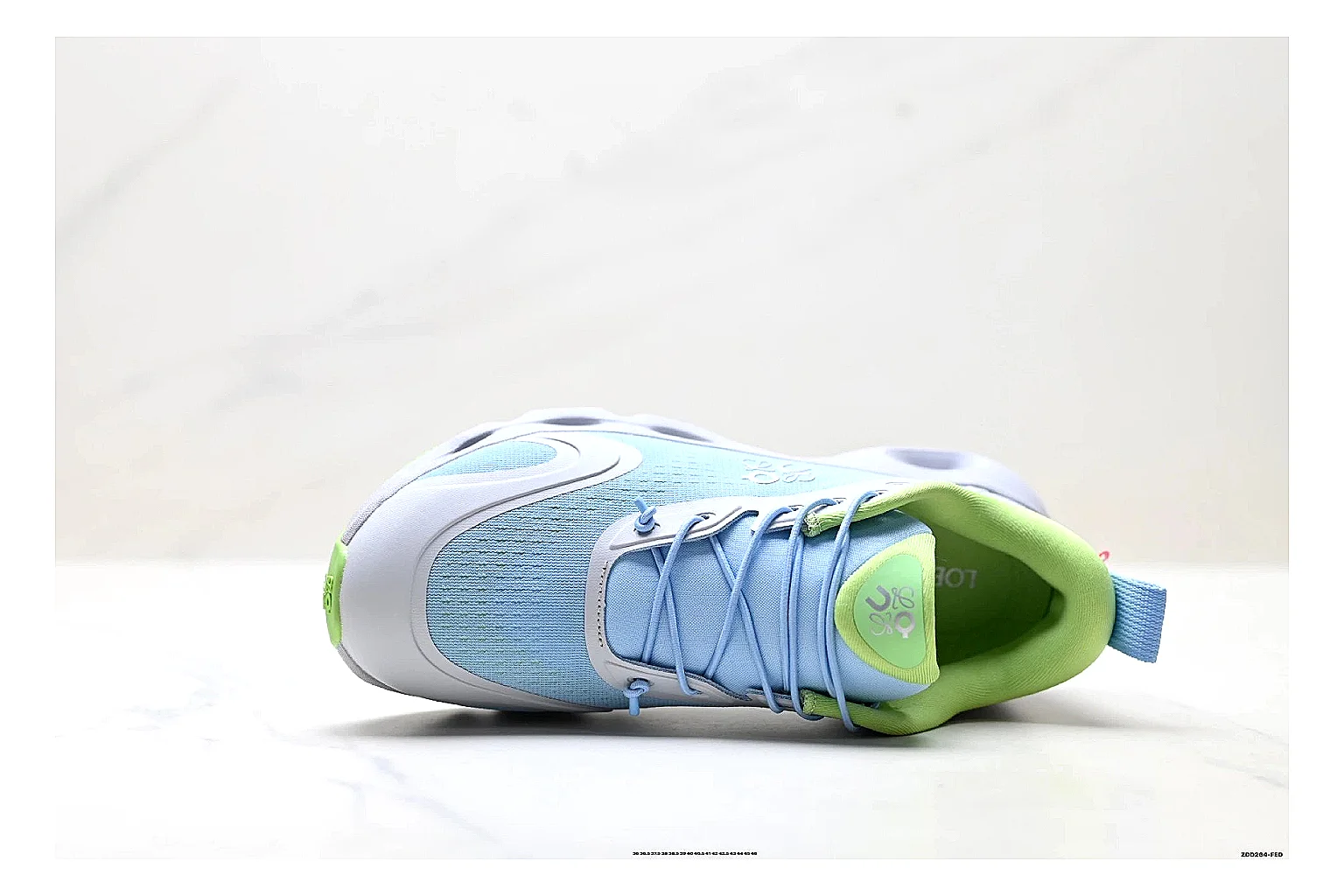 On Cloudsurfer Sky Blue Green Sneakers comparison signal photo with sky blue green running sneakers with mesh texture, side-profile shape, upper panel lines, and outsole detail thumbnail 2