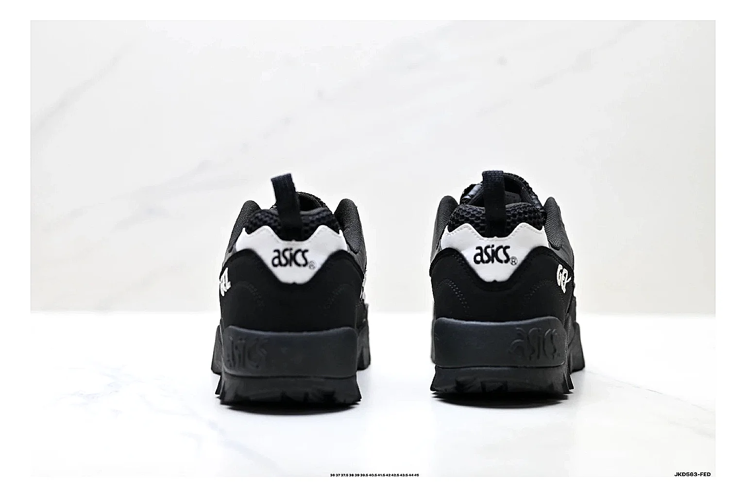 Onitsuka Tiger Gel-Tru Black White Sneakers comparison signal photo with black white trail runner sneakers with mesh-leather texture, side-profile shape, upper panel lines, and outsole detail thumbnail 3