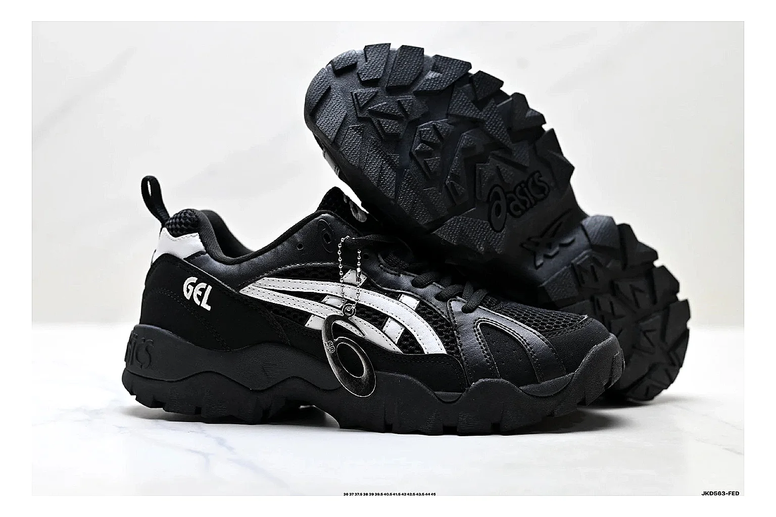 Onitsuka Tiger Gel-Tru Black White Sneakers comparison signal photo with black white trail runner sneakers with mesh-leather texture, side-profile shape, upper panel lines, and outsole detail thumbnail 5