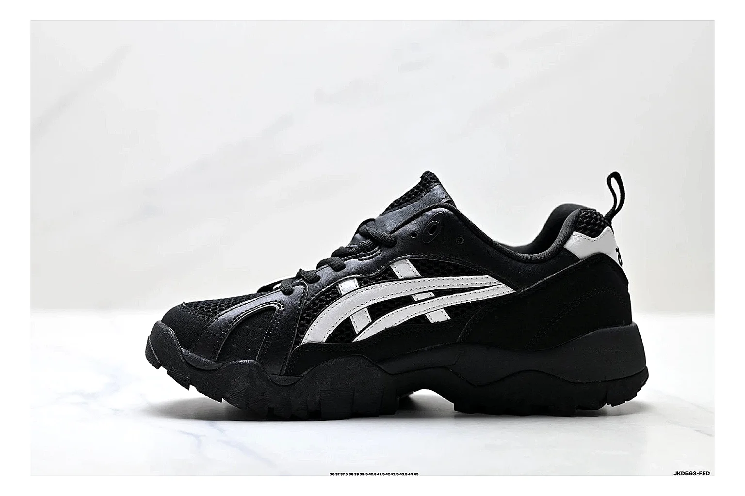 Onitsuka Tiger Gel-Tru Black White Sneakers comparison signal photo with black white trail runner sneakers with mesh-leather texture, side-profile shape, upper panel lines, and outsole detail thumbnail 6