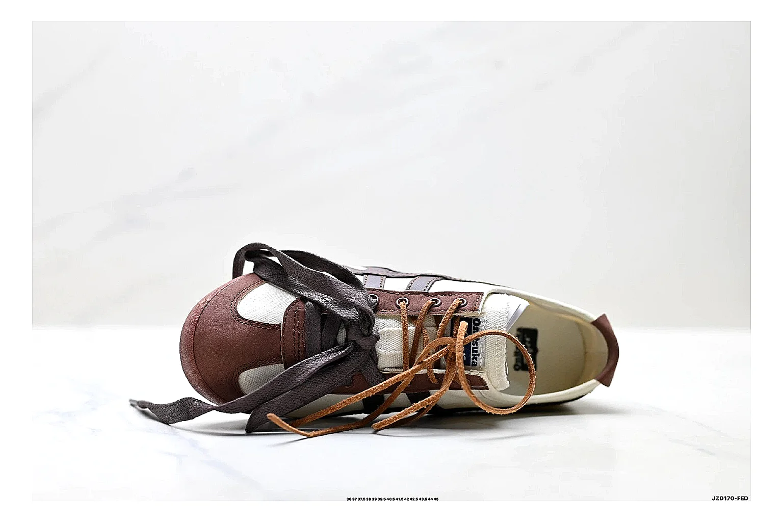 Onitsuka Tiger Mexico 66 Brown Cream Sneakers comparison signal photo with brown cream low-top sneakers with leather texture, side-profile shape, upper panel lines, and outsole detail