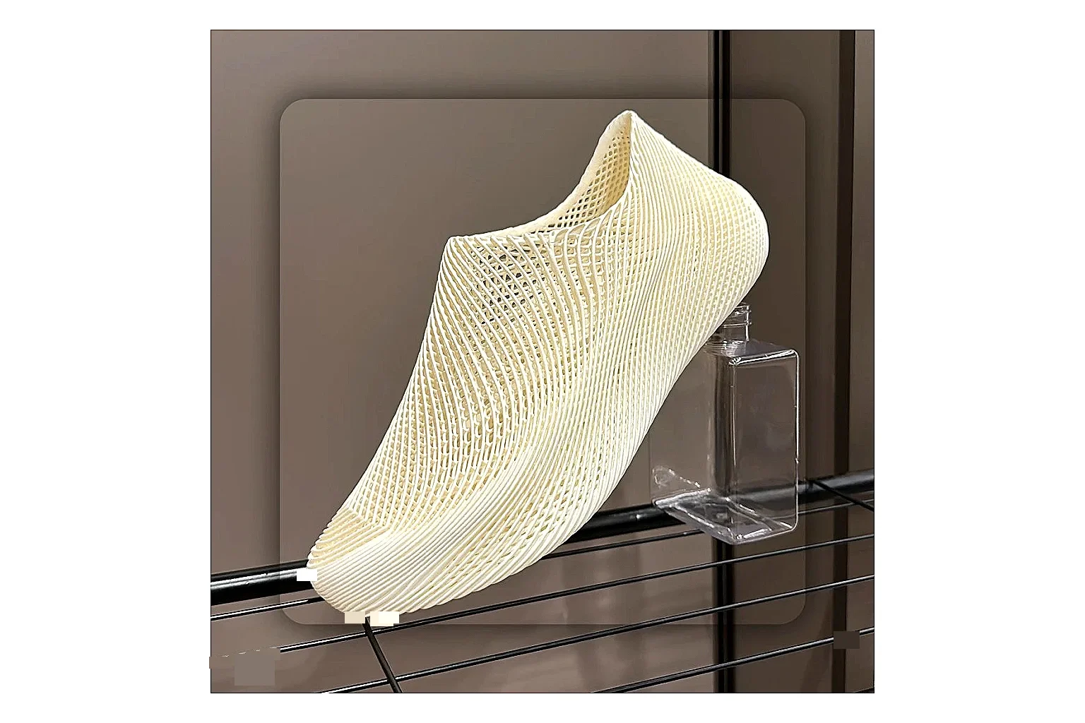 Other 4D Printed Cream Slip-On Sneakers comparison photo showing cream open-grid upper, seamless slip-on profile, sculpted sole, and soft futuristic casual shape