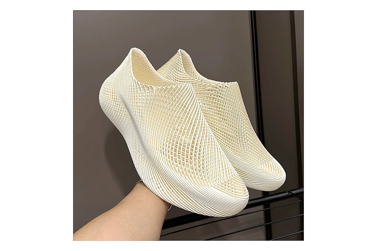 Other 4D Printed Cream Slip-On Sneakers comparison photo showing cream open-grid upper, seamless slip-on profile, sculpted sole, and soft futuristic casual shape thumbnail 3