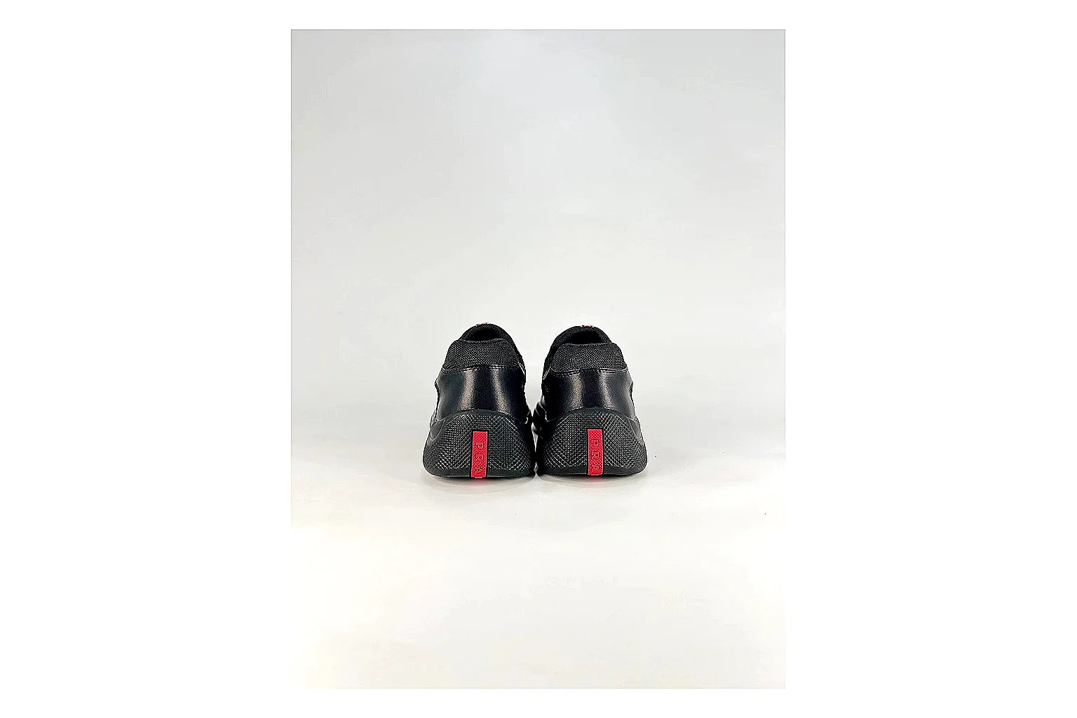 Black Runner Black Sneaker comparison photo showing black mesh runner upper, tonal overlays, modern running shape, and dark cushioned sole thumbnail 4