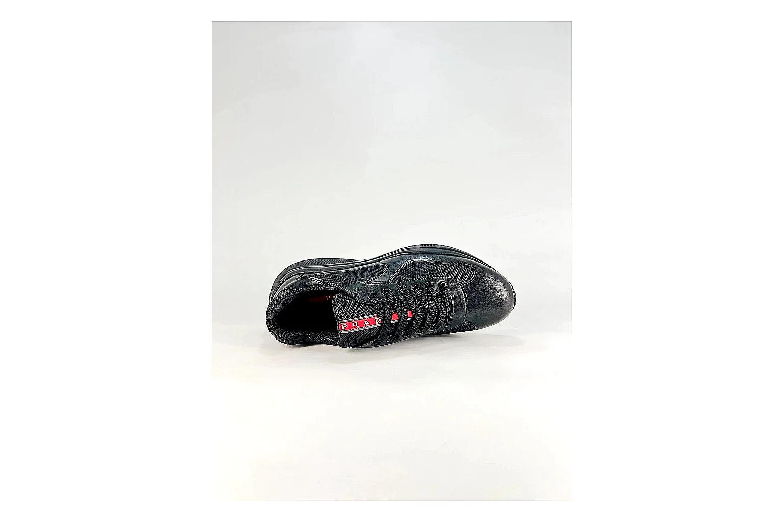 Black Runner Black Sneaker comparison photo showing black mesh runner upper, tonal overlays, modern running shape, and dark cushioned sole thumbnail 5