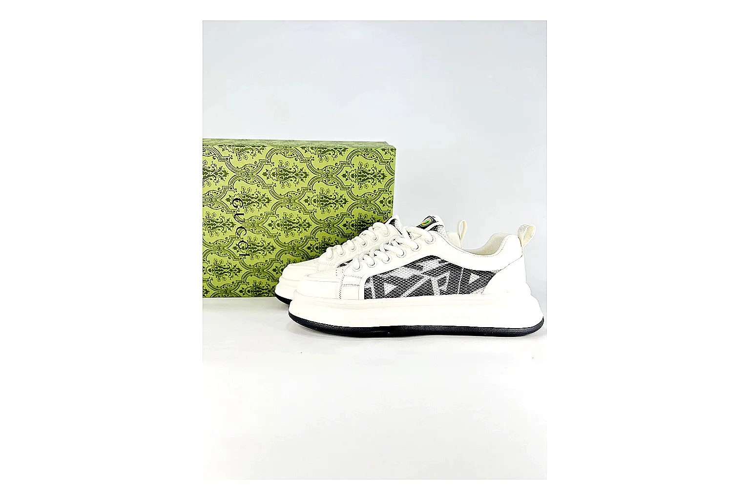 Low Runner White Black Sneaker comparison photo showing white black synthetic low-top upper, minimal runner shape, clean panels, and casual sole