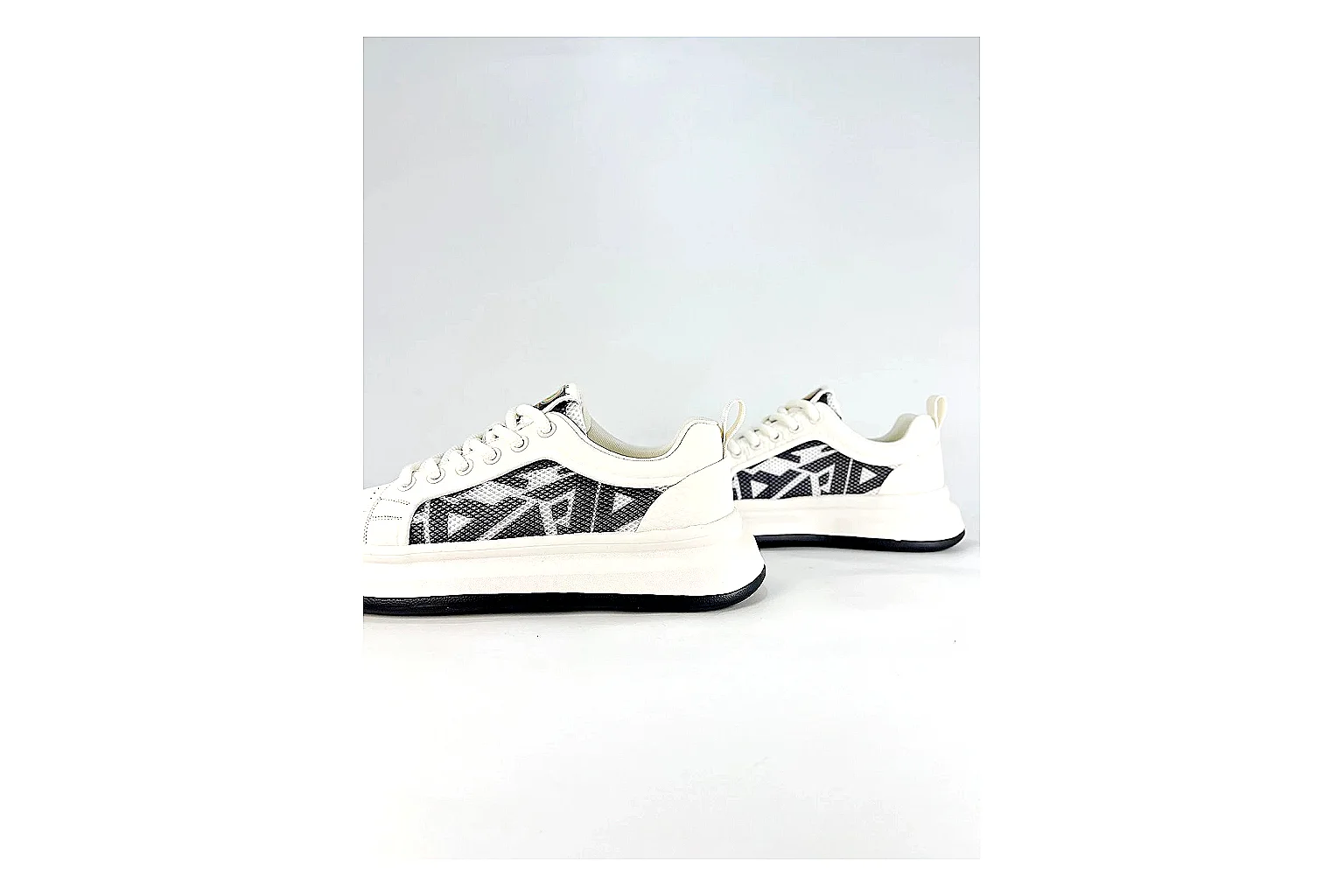 Low Runner White Black Sneaker comparison photo showing white black synthetic low-top upper, minimal runner shape, clean panels, and casual sole thumbnail 3