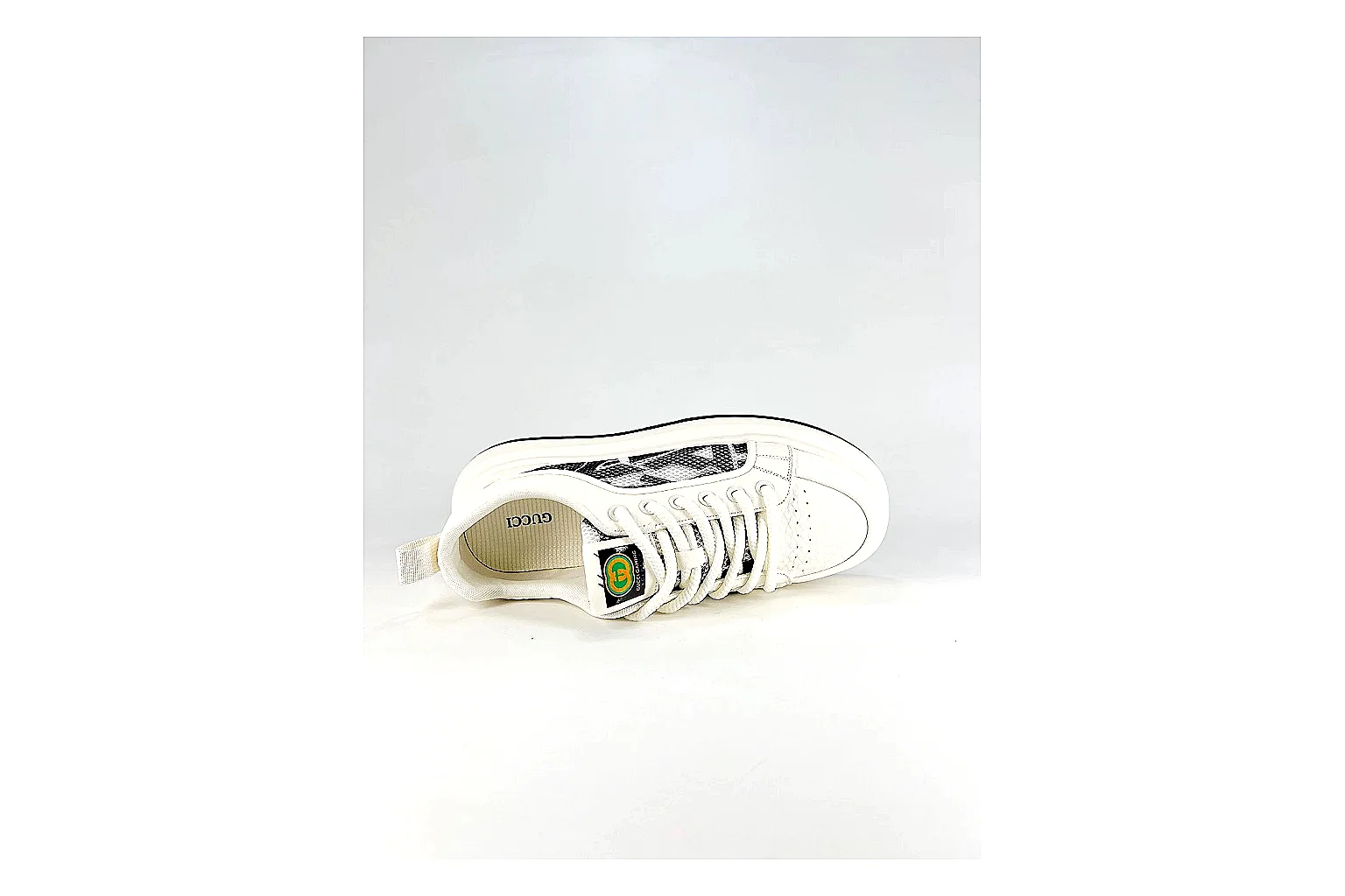 Low Runner White Black Sneaker comparison photo showing white black synthetic low-top upper, minimal runner shape, clean panels, and casual sole thumbnail 5
