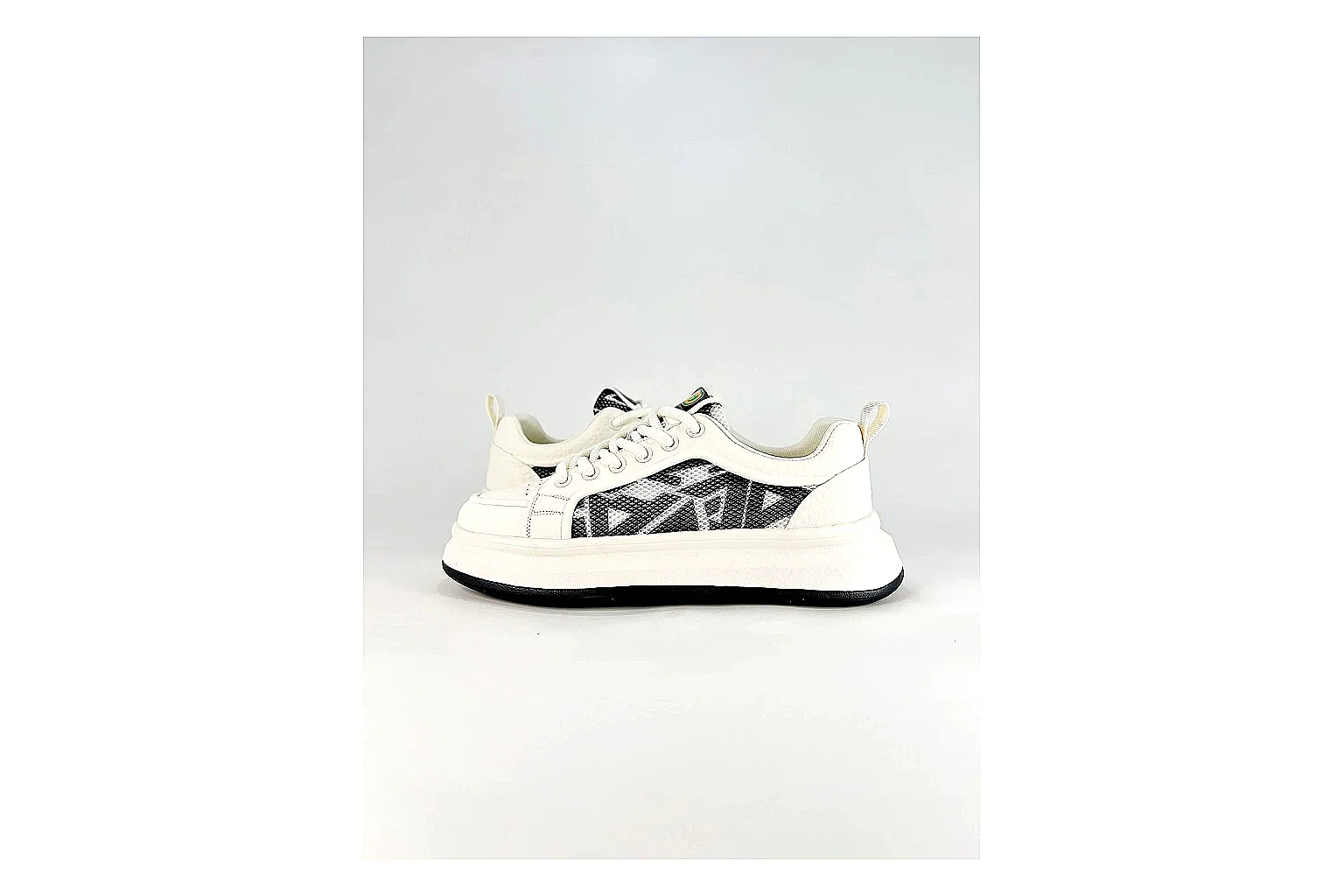 Low Runner White Black Sneaker comparison photo showing white black synthetic low-top upper, minimal runner shape, clean panels, and casual sole thumbnail 6