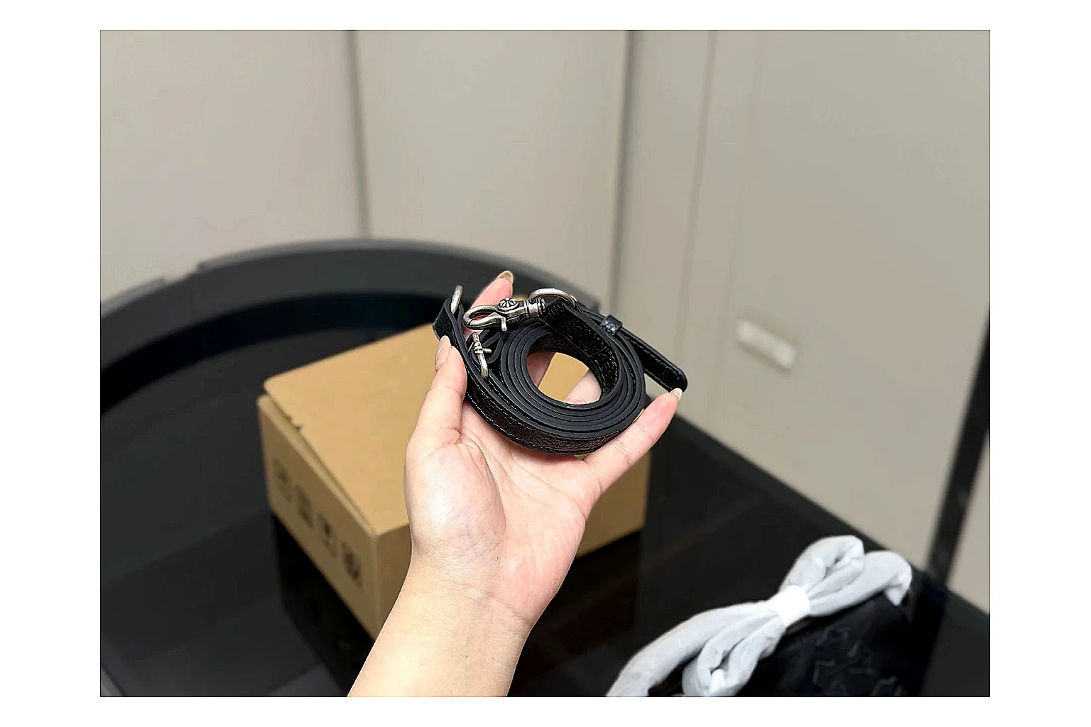 Mini Top Handle Black Bag comparison photo showing black leather compact bag body, structured handle, clean top-handle shape, and simple hardware thumbnail 3