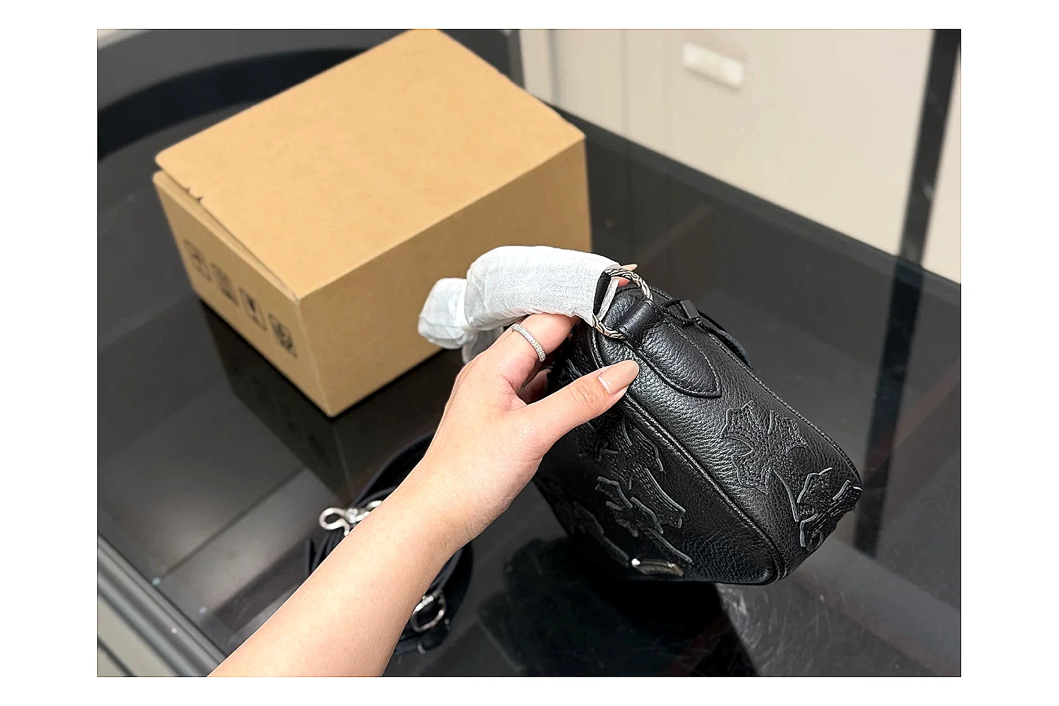 Mini Top Handle Black Bag comparison photo showing black leather compact bag body, structured handle, clean top-handle shape, and simple hardware thumbnail 5