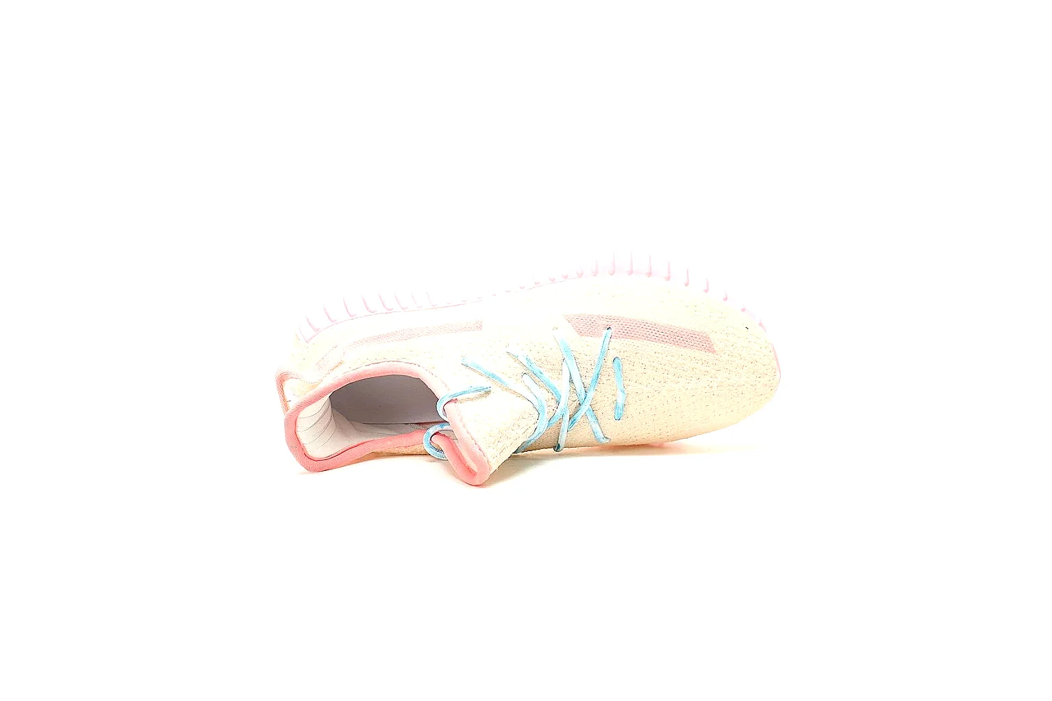 Pastel cream knit runner with blue laces and pink ribbed sole for QC comparison