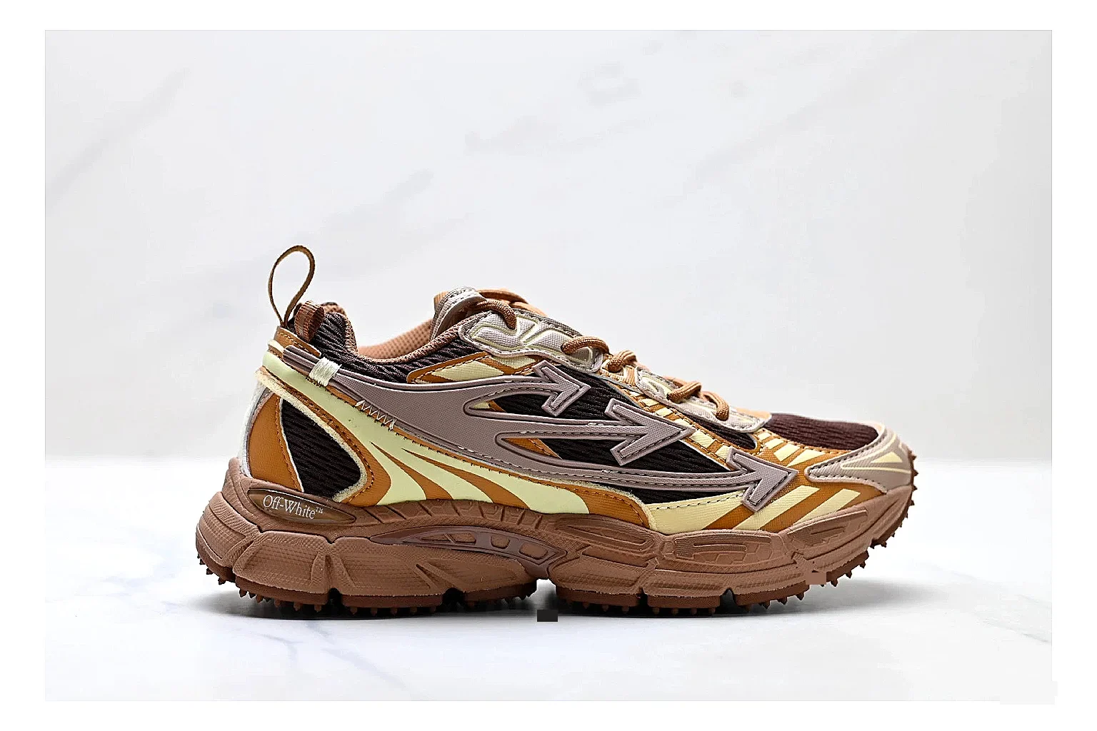 Trail Runner Brown Gold Sneaker comparison photo showing brown gold mesh-suede runner upper, rugged trail profile, protective overlays, and traction sole