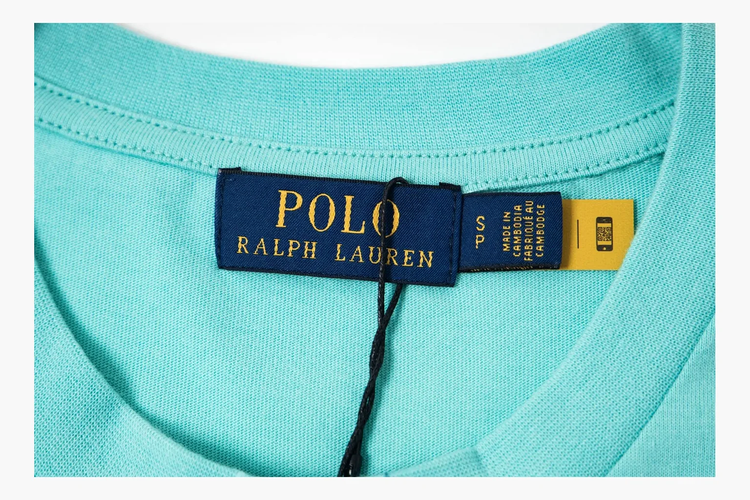 Aqua Polo pocket tee comparison photo with chest logo thumbnail 5