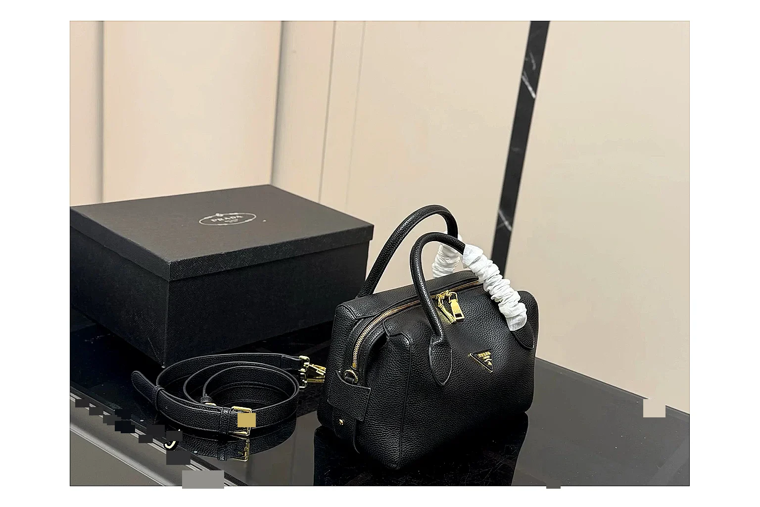 Prada Mini Top Handle Black comparison photo showing black leather mini bag body, structured top handle, compact silhouette, and clean metal hardware