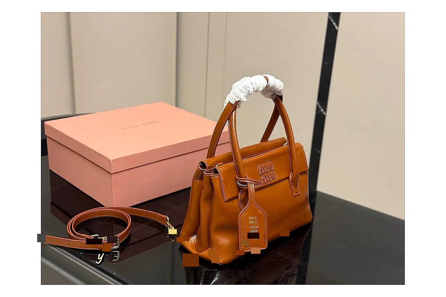 Prada Mini Top Handle Orange Brown comparison photo showing orange brown leather mini bag body, structured top handle, compact shape, and clean hardware details