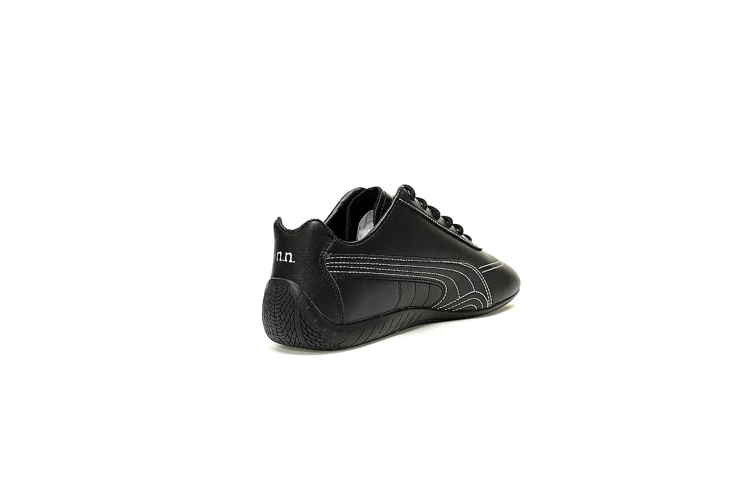 Puma black stitched low-top sneaker side profile QC proof