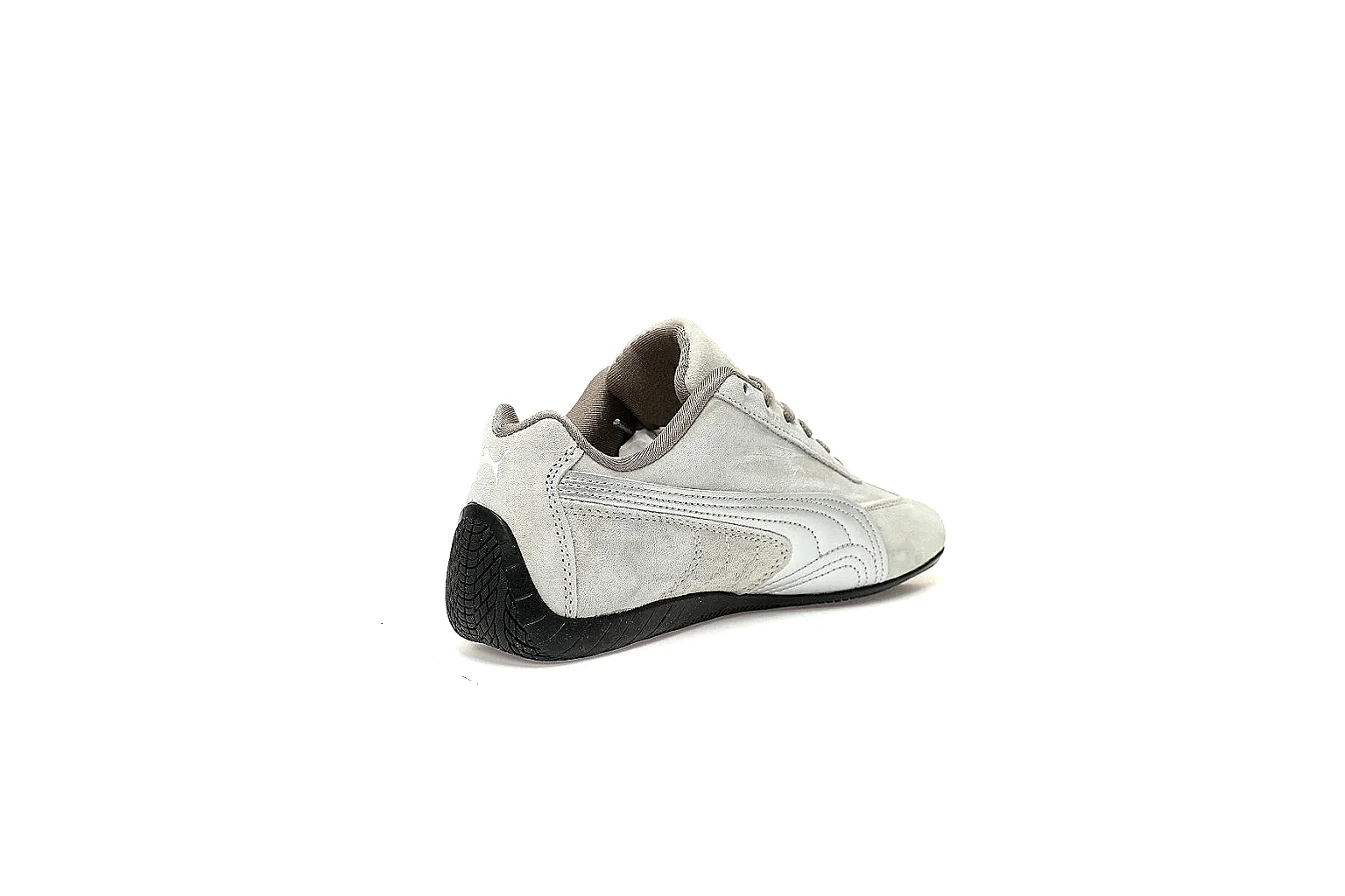 Puma grey low-profile trainer with taupe laces and black rubber sole