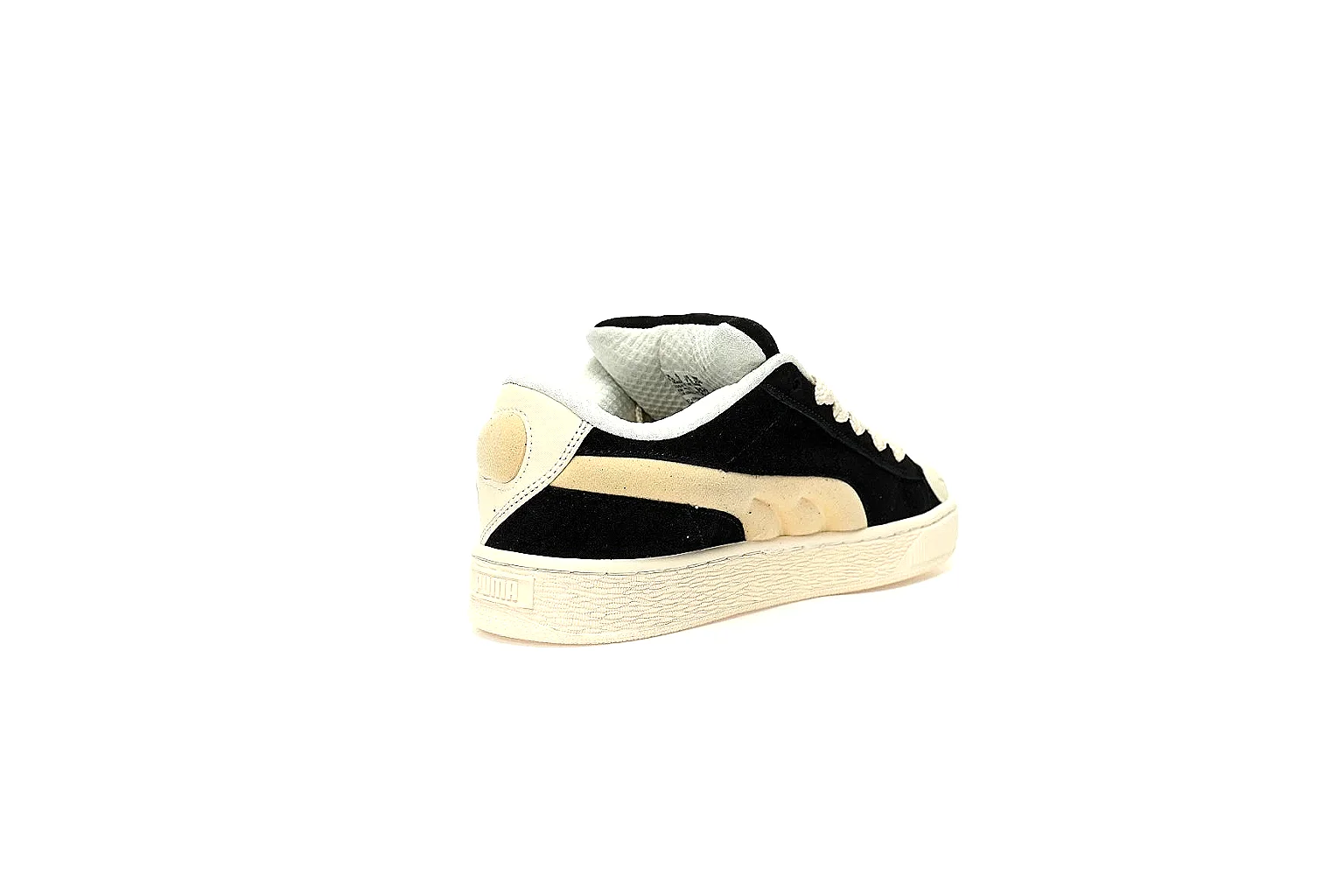 Puma black cream platform sneaker with visible side logo and cream stripe