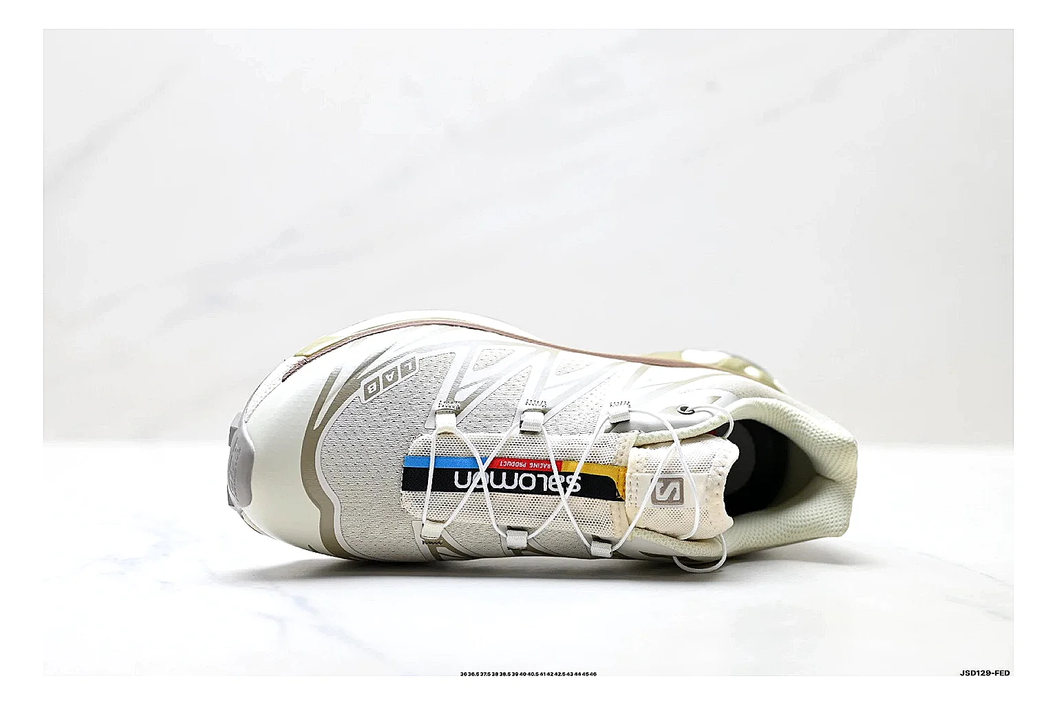 Salomon Xt Runner White Gold comparison photo showing white mesh trail-runner upper, gold accents, speed-lace style structure, and rugged sole thumbnail 6