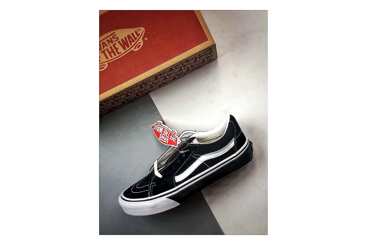 Vans Old Skool Black White comparison photo showing black canvas-suede low-top upper, white side stripe, padded collar, and classic vulcanized skate sole thumbnail 2