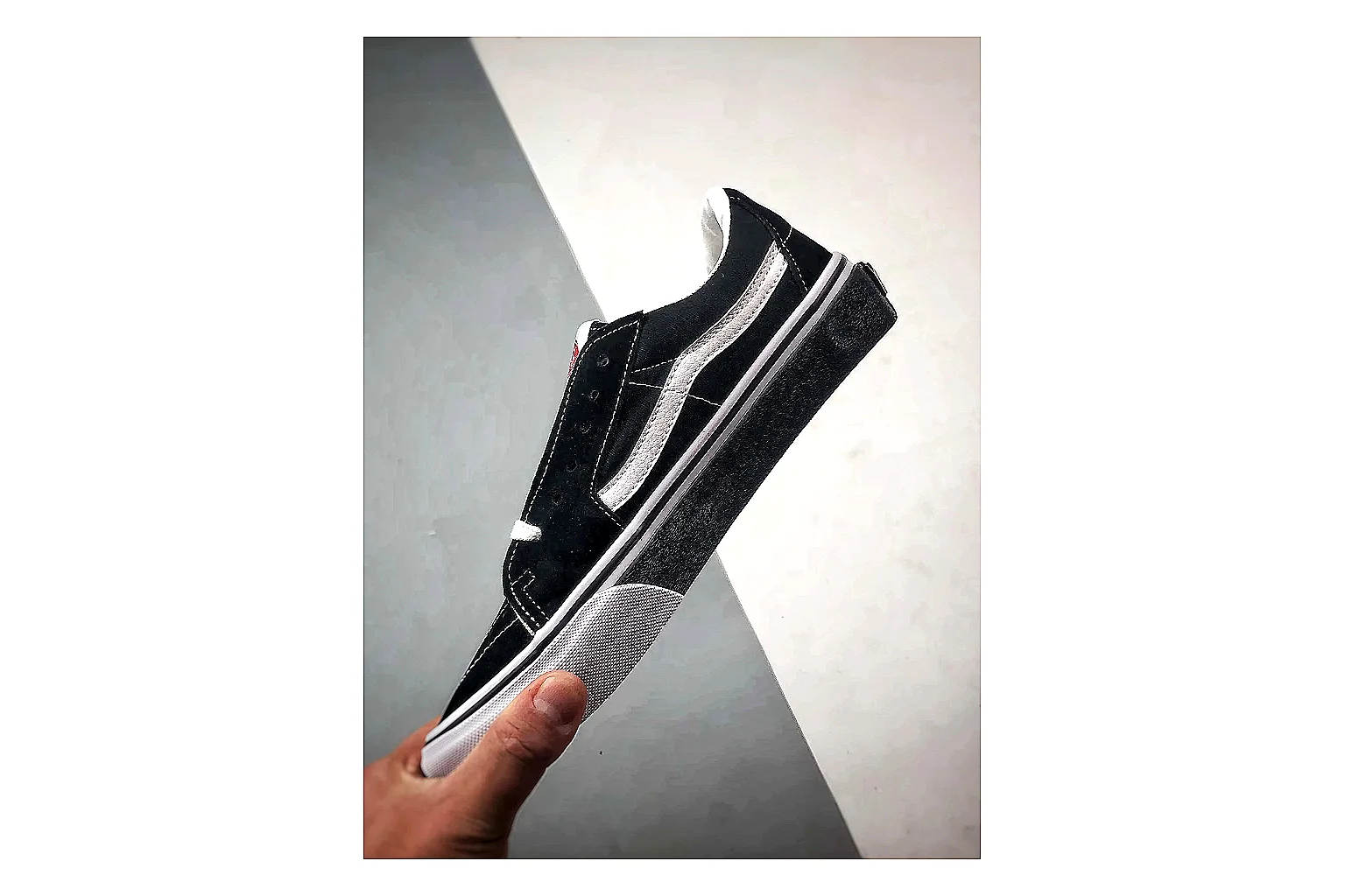Vans Old Skool Black White comparison photo showing black canvas-suede low-top upper, white side stripe, padded collar, and classic vulcanized skate sole thumbnail 3