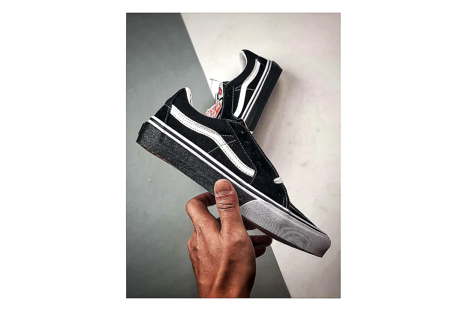 Vans Old Skool Black White comparison photo showing black canvas-suede low-top upper, white side stripe, padded collar, and classic vulcanized skate sole thumbnail 4